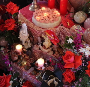 Beautiful candles, statues, flowers, and offerings at one of our Aphrodite altars