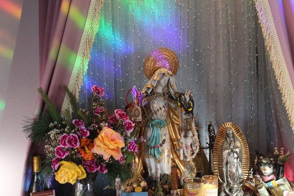 Rainbows of light sprayed across the altar at the shop