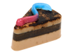 Graveyard Dirt Cake Soap - triangular slice-shaped soap with layered chocolate and caramel tones, real cocoa topping, and a pink and blue gummy worm embed on top, on a white background