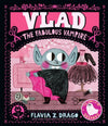 Front cover of Vlad, The Fabulous Vampire - a wide-eyed vampire with rosy cheeks sewing a pink and black cape in a costume workshop, illustrated in bold pink and black folk art style