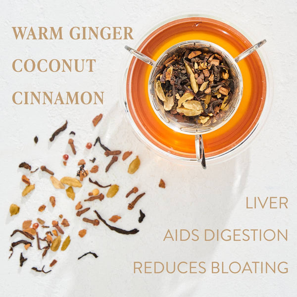 A steeping cup of chai with ingredients listed as well as health benefits. Warm ginger, coconut, cinnamon. Liver, aids digestion, reduces bloating.
