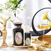 A tasteful arrangement of teas, flowers, and beautiful little trinkets