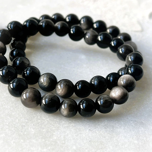 Two silver sheen obsidian braelets