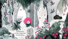 Interior spread from Vlad, The Fabulous Vampire showing Vlad and a pink-haired friend exploring a gothic garden with bats, roses, and stone arches in muted tones with pink accents