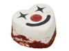 Funhouse Bath Fizz angled view showing the heart shape with red glittered base, white top, and clown face with sparkle eyes, red nose, and black smile