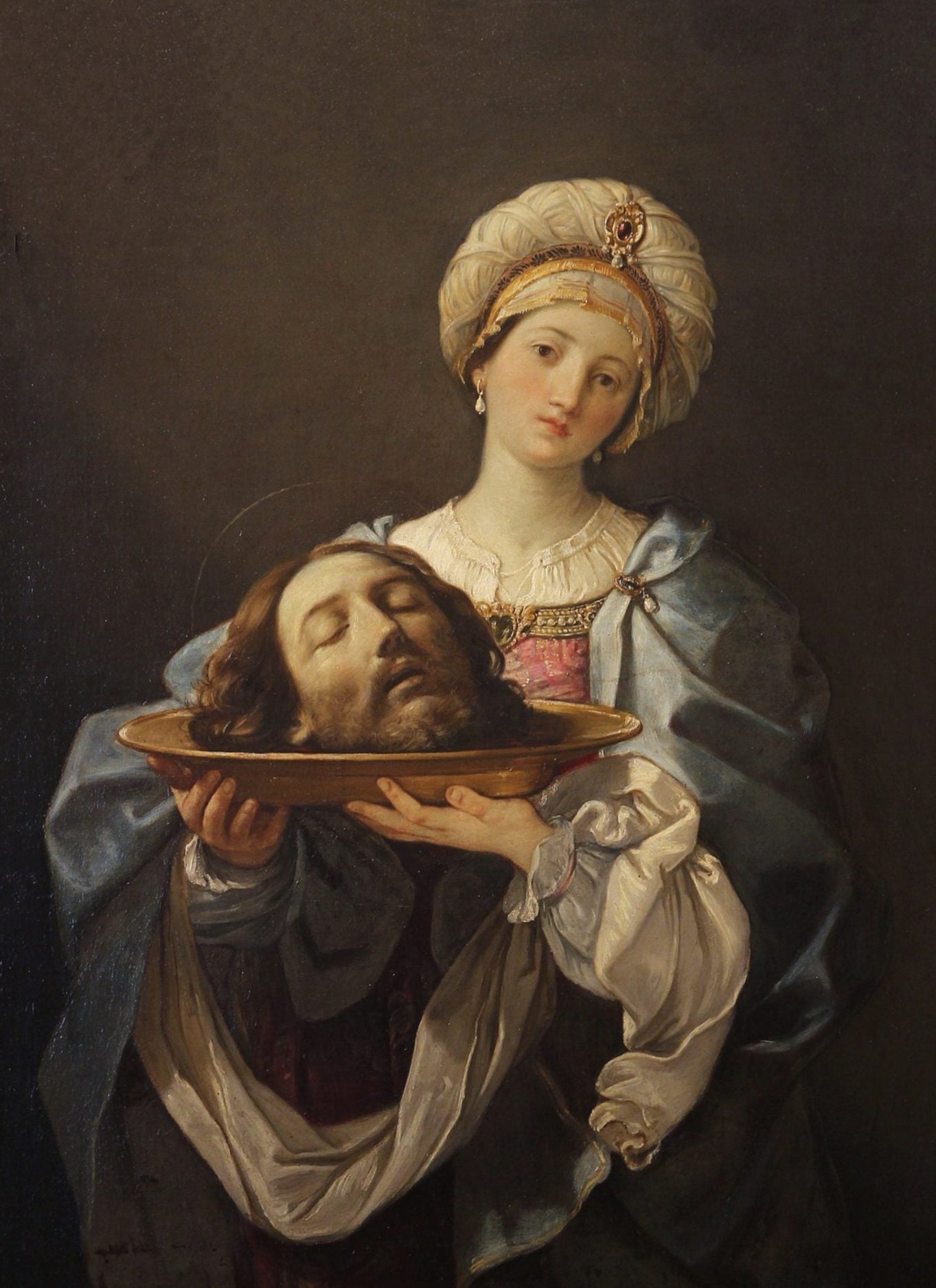 This gift card features a painting of a woman holding a head on a platter against a dark background