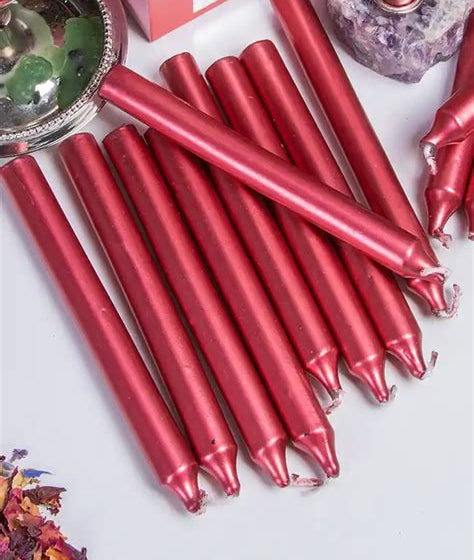Red chime candles laid out in a row