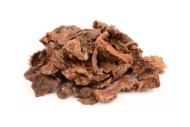 A pile of dried, curled brown roots or bark pieces, likely a natural herbal supplement, photographed on a solid white background.