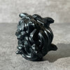 Black obsidian Medusa head, back of her head