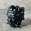 Black obsidian Medusa head, looking left